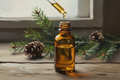 oil dropper dropping essential oil into an amber colored bottle with fir needle in the background